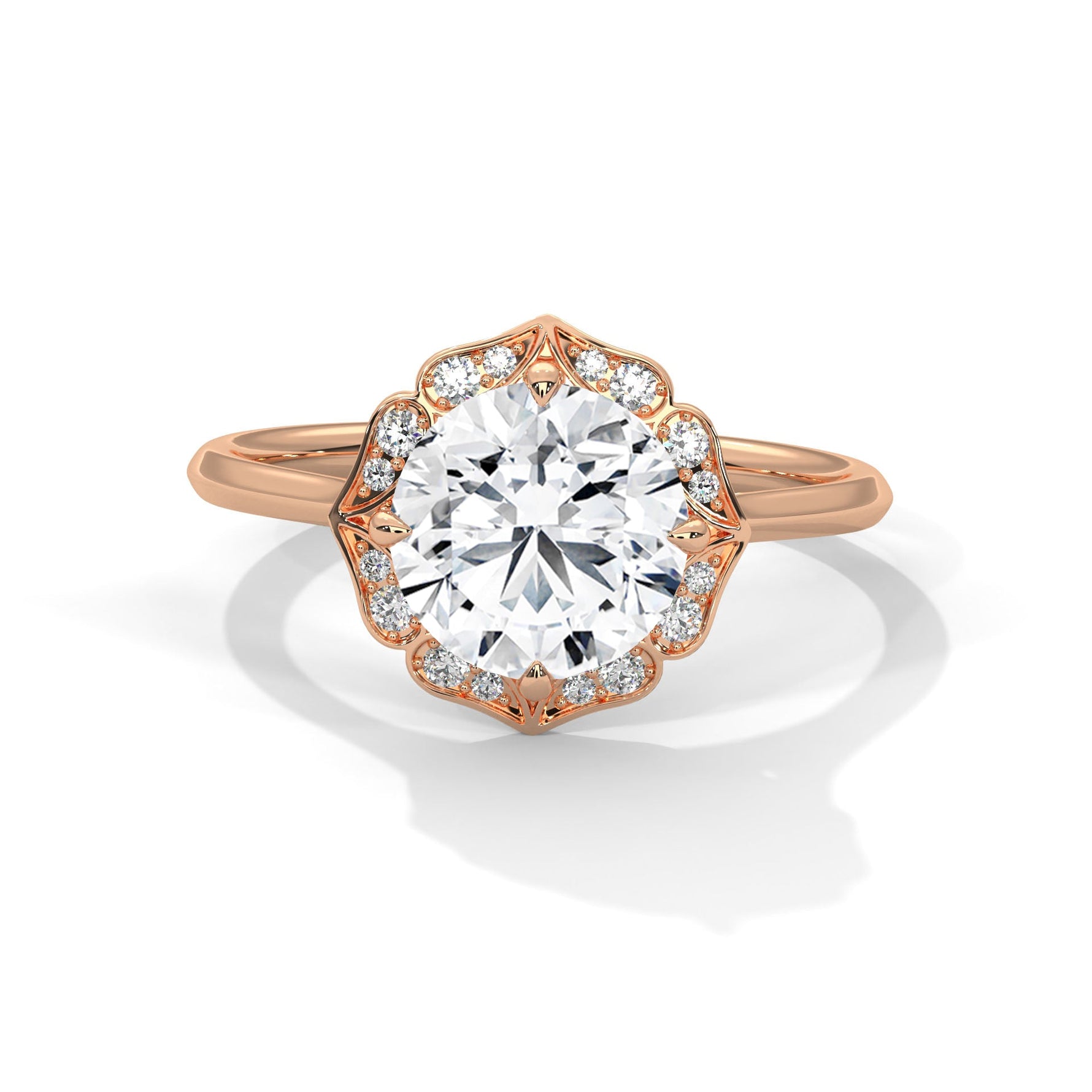 Rose gold ring with a large diamond on a white background #rose-gold
