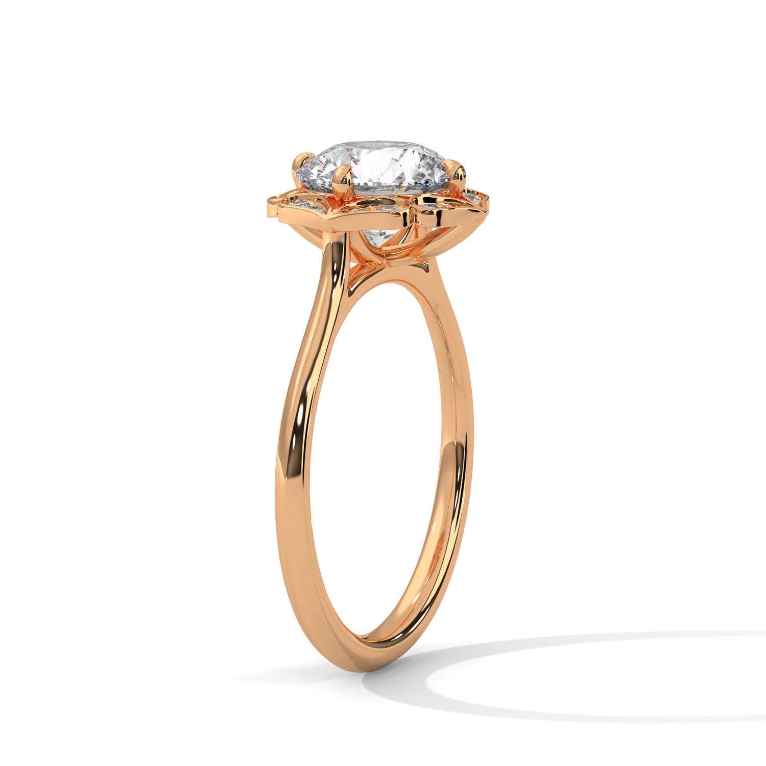 Rose gold ring with a large diamond on a white background 