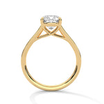 Gold ring with a large diamond on a white background 