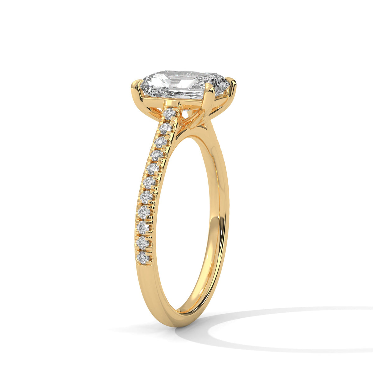 Gold ring with a large diamond on a white background 