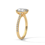 Gold ring with a large diamond on a white background 