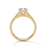 Gold ring with a large diamond on a white background 