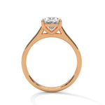 Rose gold ring with a large diamond on a white background 