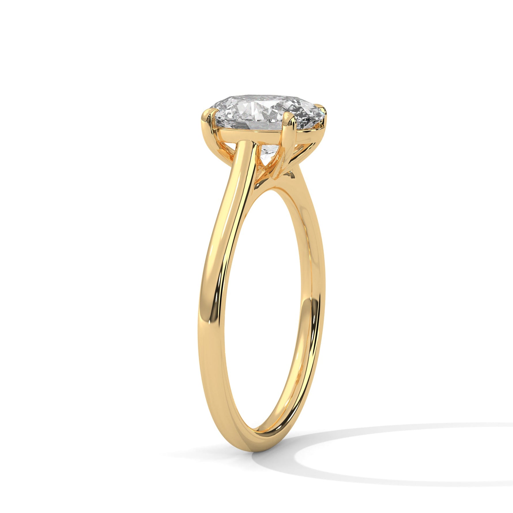 Gold ring with a large diamond on a white background 