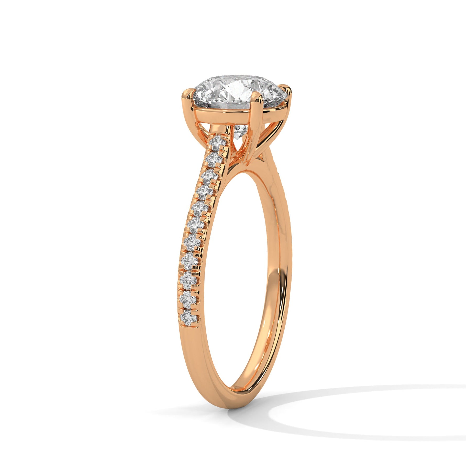 Rose gold ring with a large diamond on a white background 