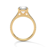 Gold ring with a large diamond on a white background 