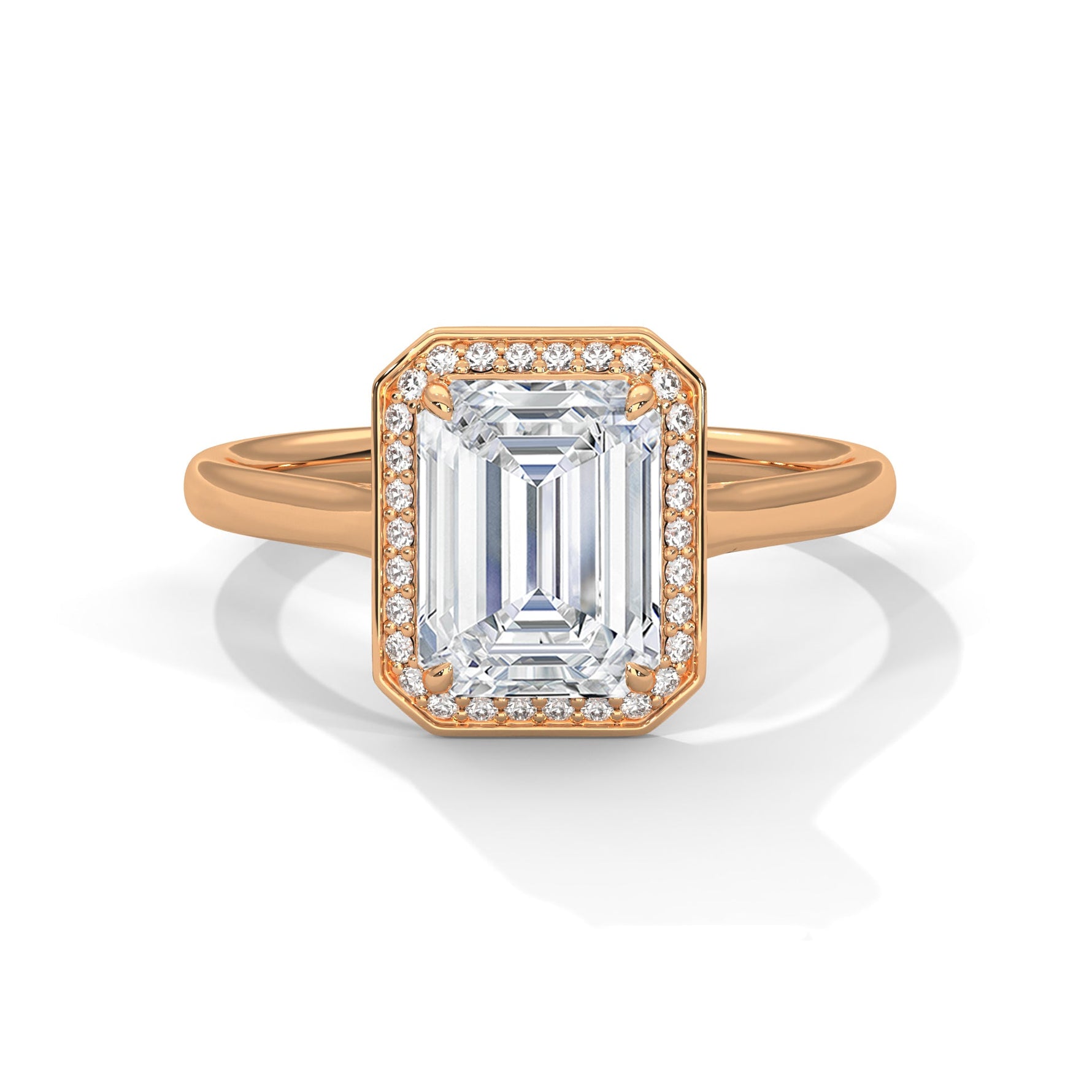 Rose gold ring with a large diamond on a white background #rose-gold