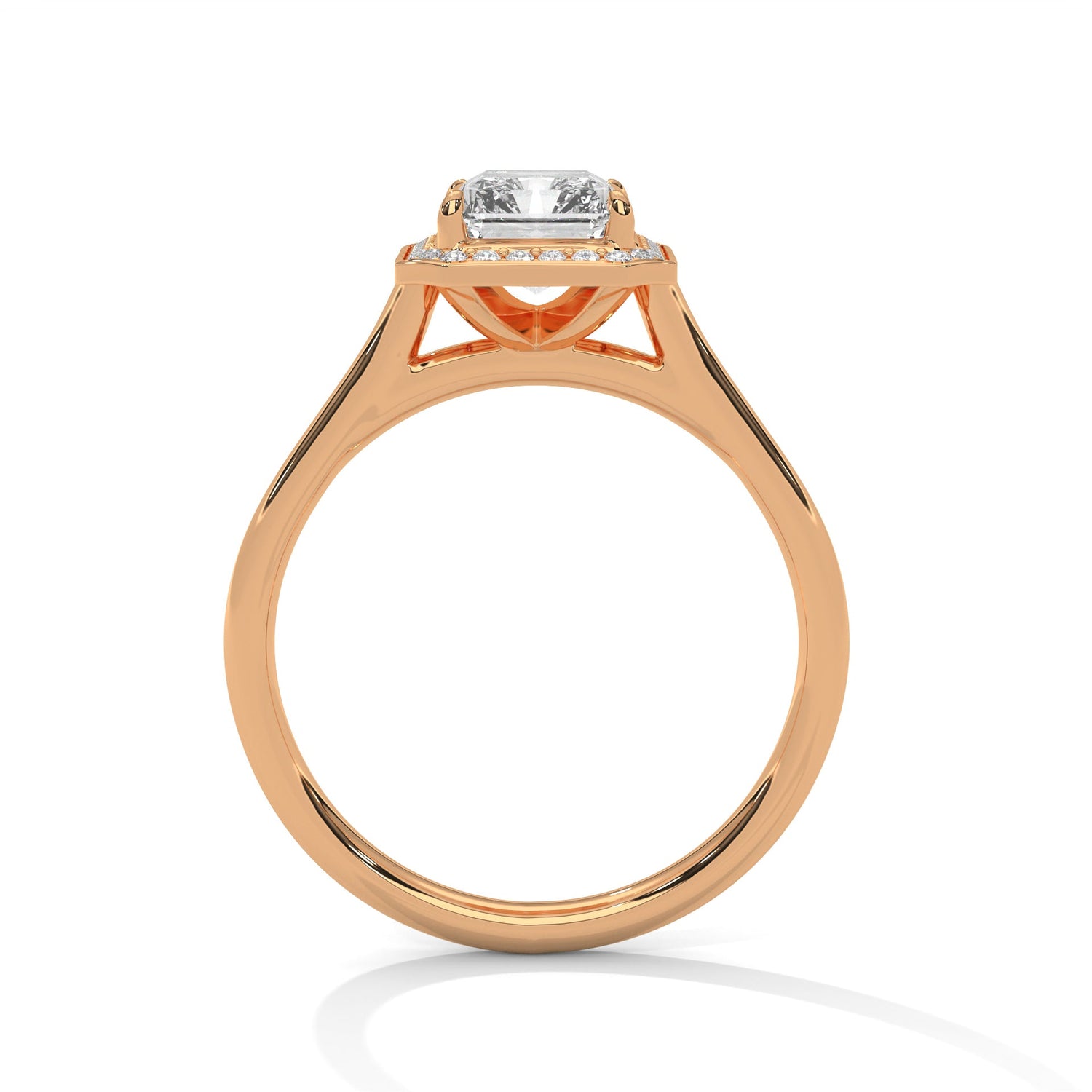 Rose gold ring with a large diamond on a white background 