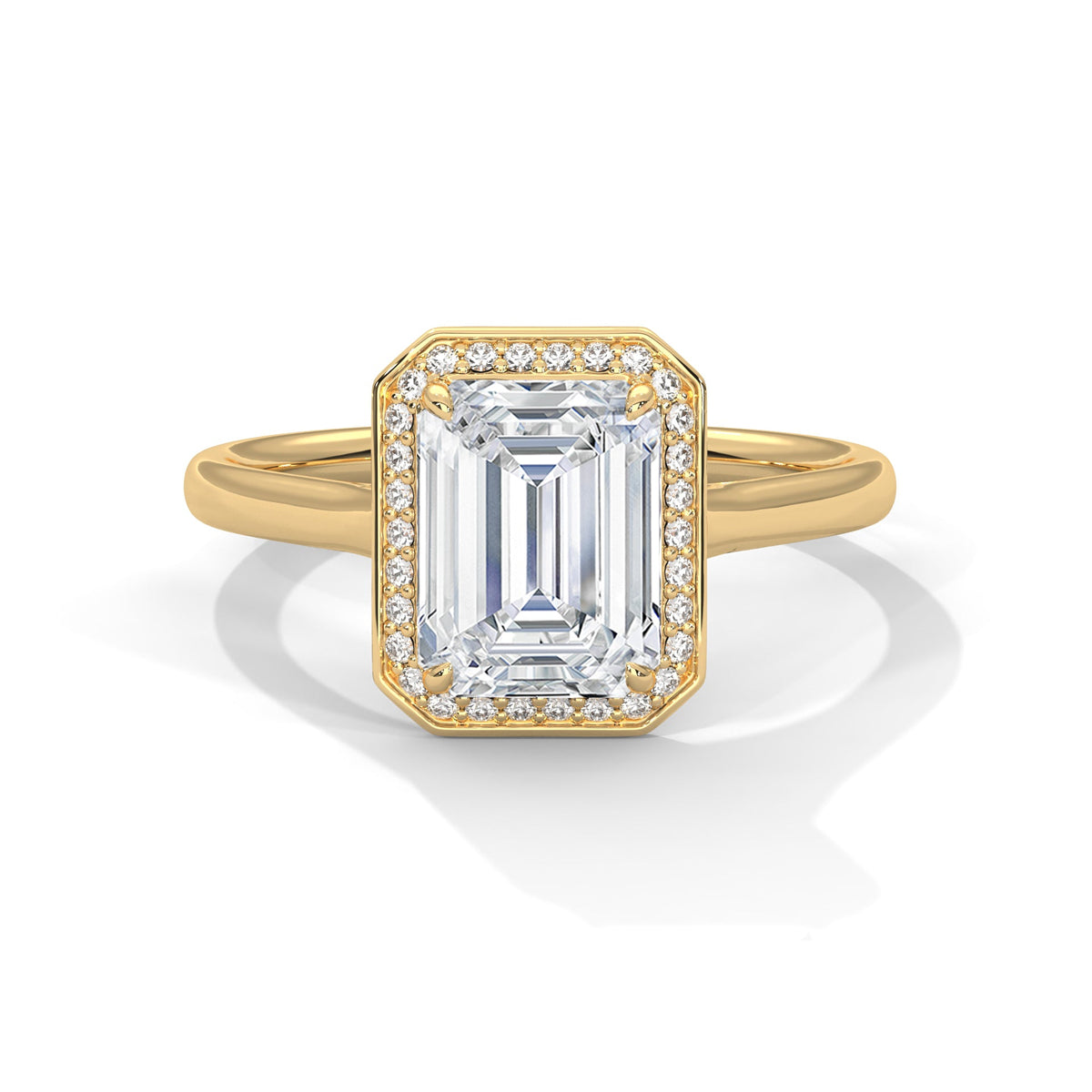 Gold ring with a large diamond on a white background 