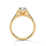 Gold ring with a large diamond on a white background 