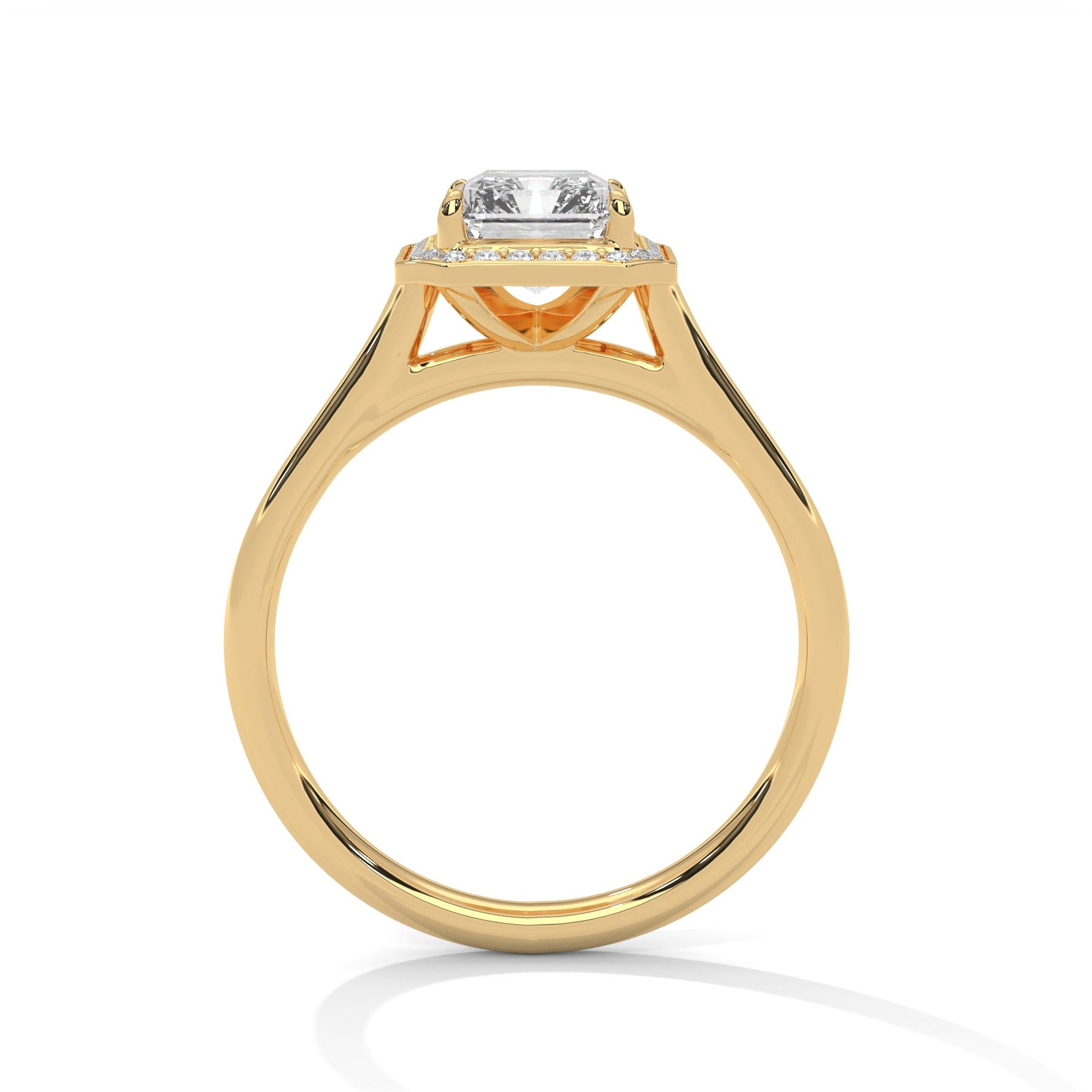 Gold ring with a large diamond on a white background 