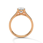Rose gold ring with a large diamond on a white background 