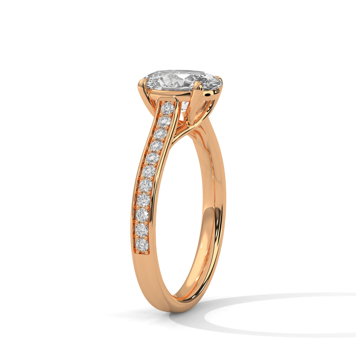 Rose gold ring with a large diamond on a white background 