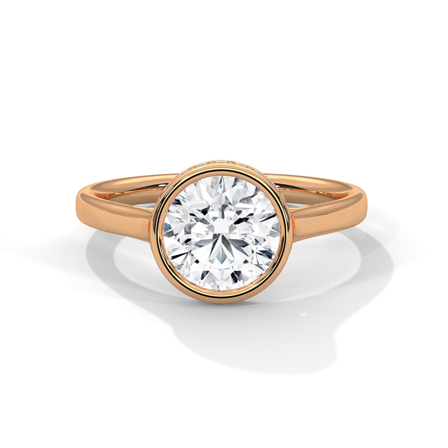 Rose gold ring with a large diamond on a white background 