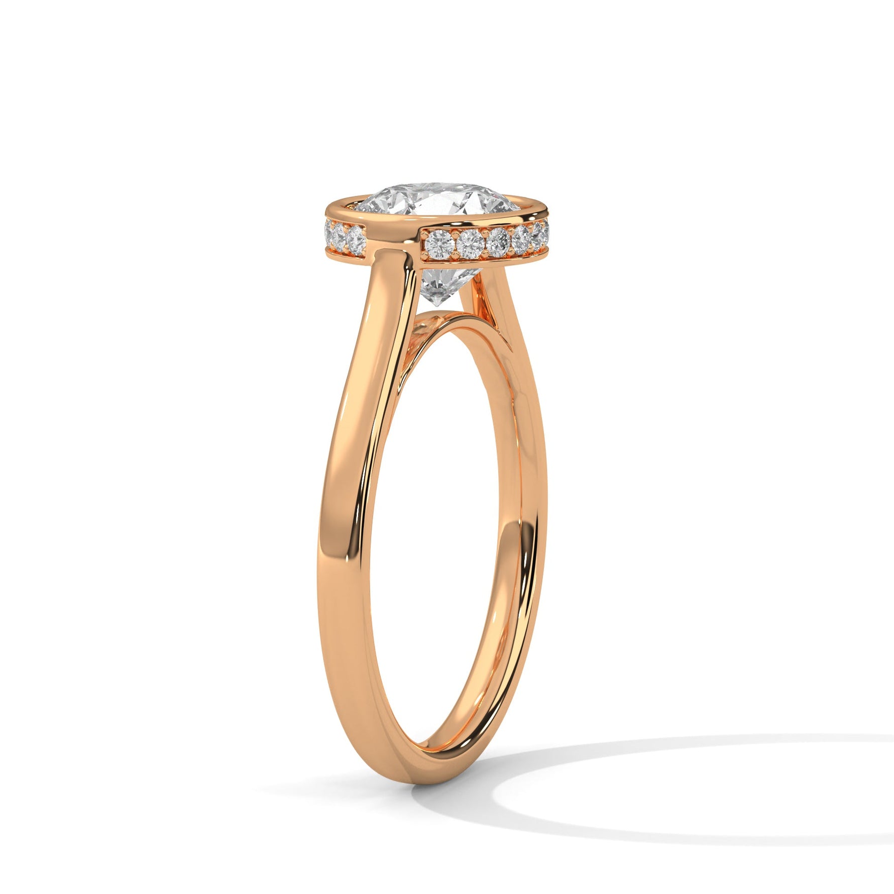 Rose gold ring with a large diamond on a white background 