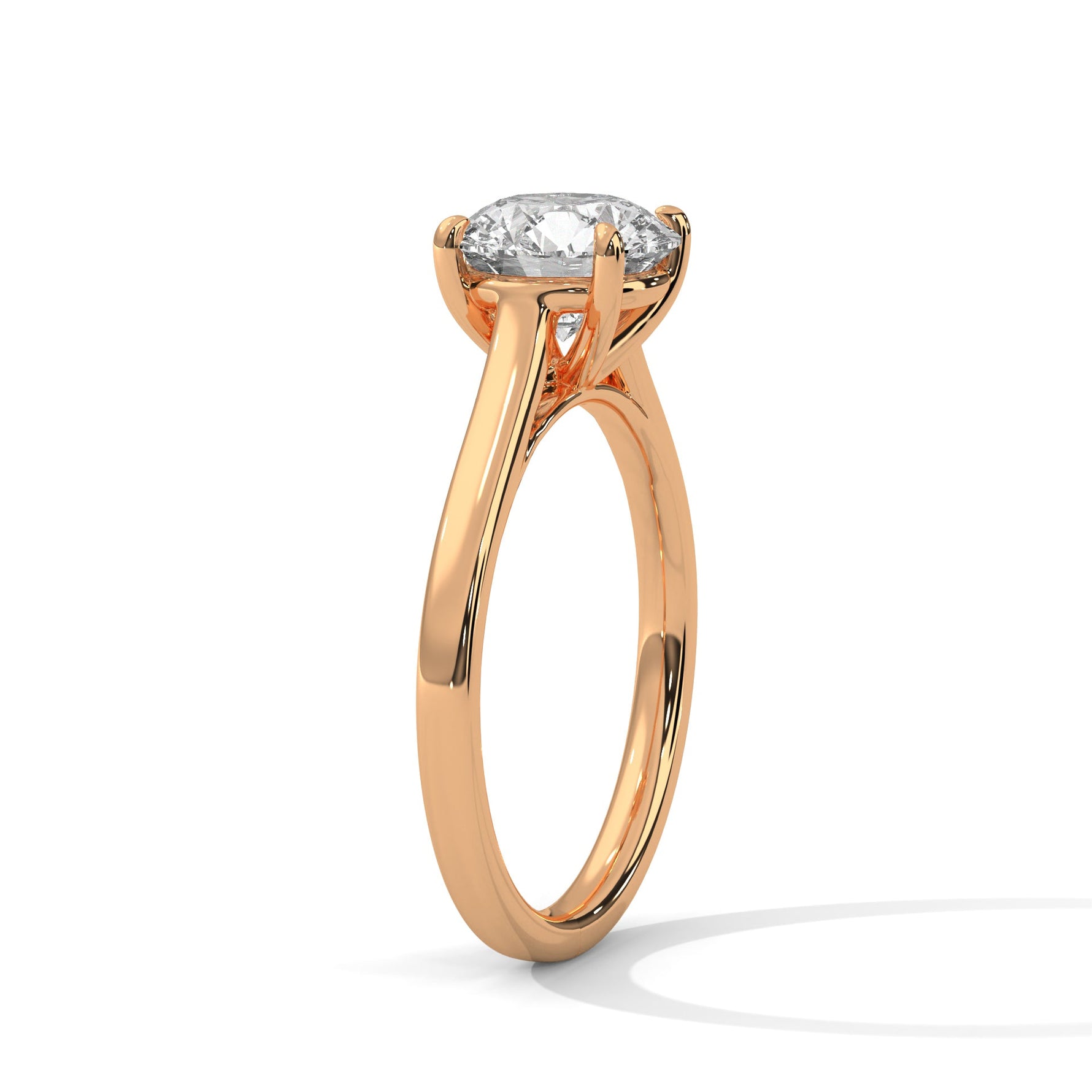 Rose gold ring with a large diamond on a white background 