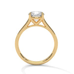 Gold ring with a large diamond on a white background 