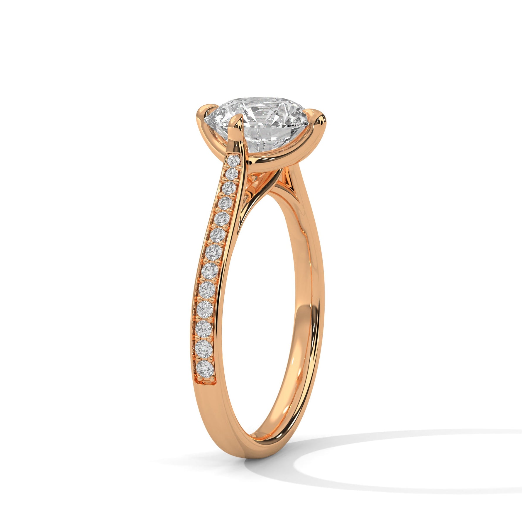 Rose gold ring with a large diamond on a white background 