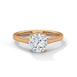 Rose gold ring with a large diamond on a white background 