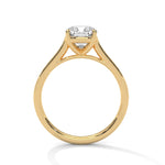 Gold ring with a large diamond on a white background 