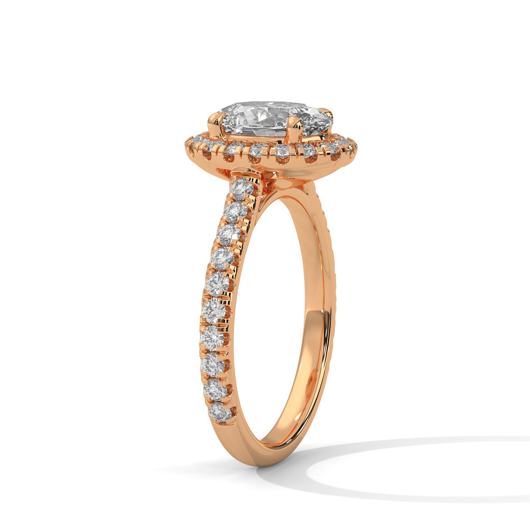 Rose gold ring with a large diamond on a white background 