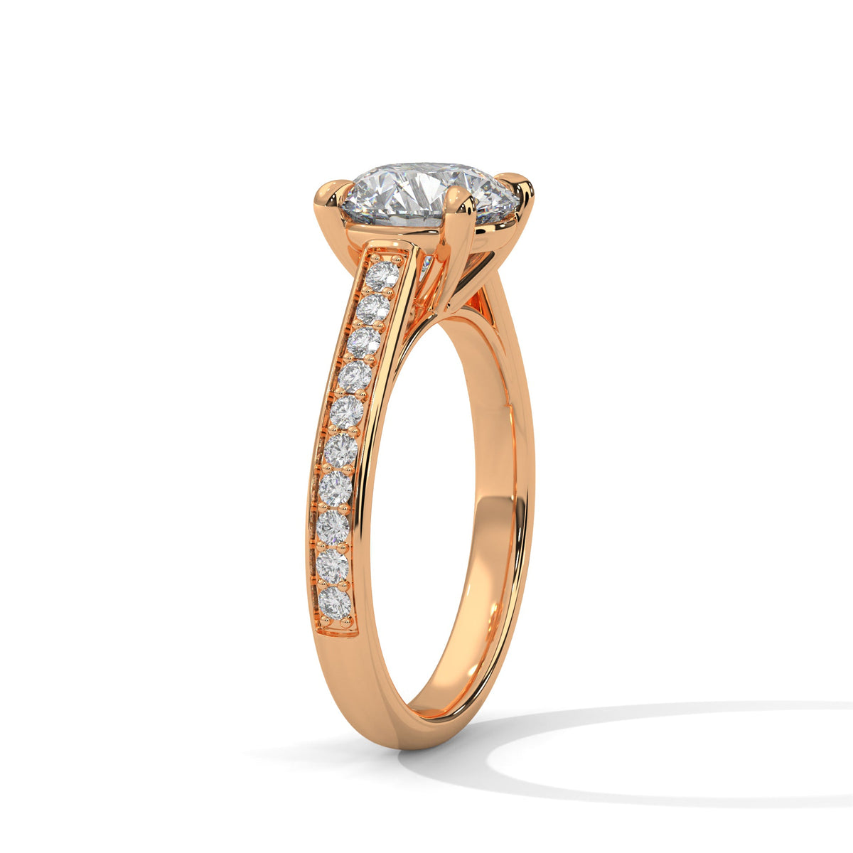 Rose gold ring with a large diamond on a white background 
