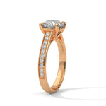 Rose gold ring with a large diamond on a white background 