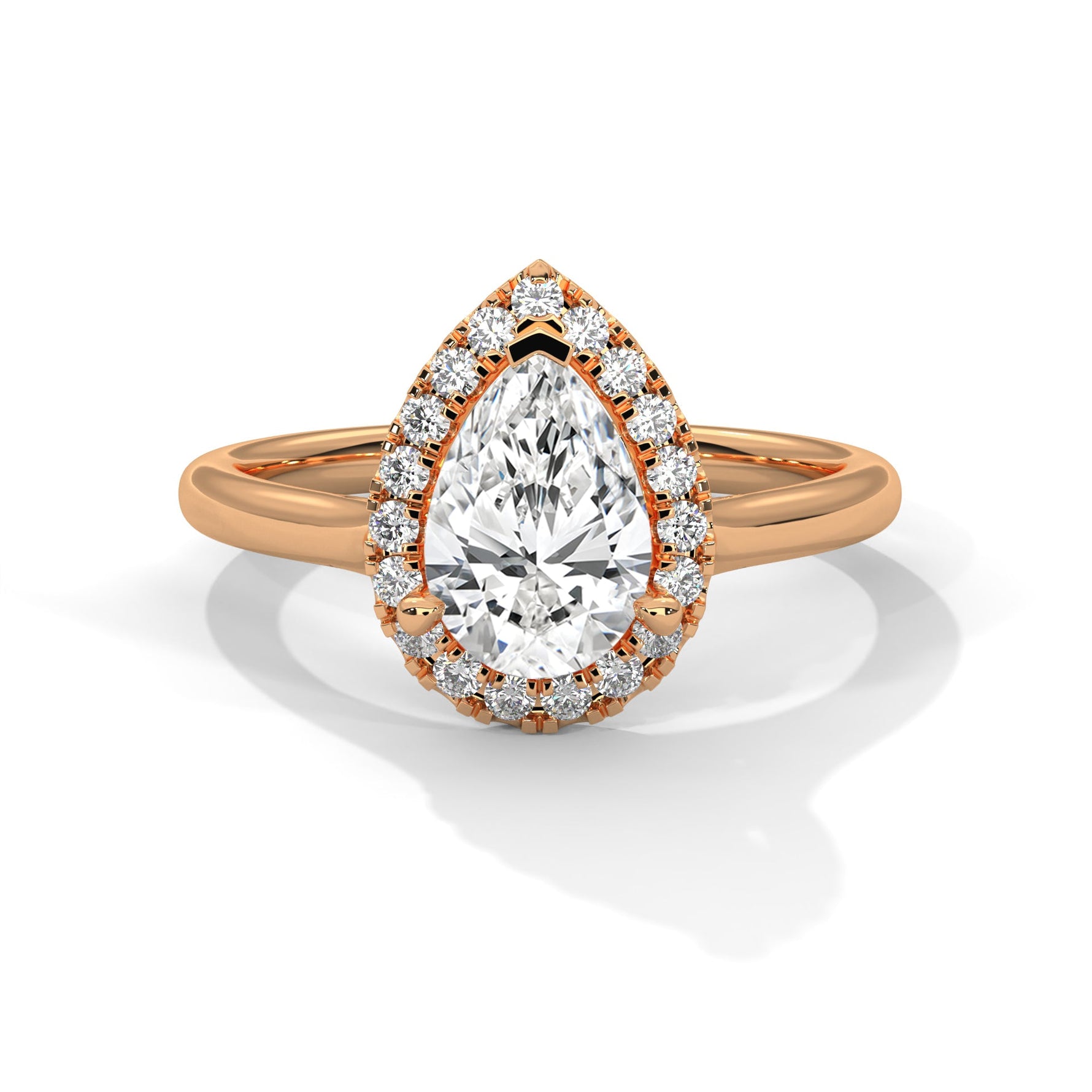 Rose gold ring with a large diamond on a white background #rose-gold