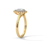 Gold ring with a large diamond on a white background 