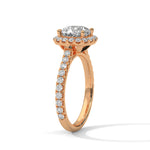 Rose gold ring with a large diamond on a white background 