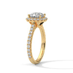 Gold ring with a large diamond on a white background 