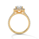 Gold ring with a large diamond on a white background 