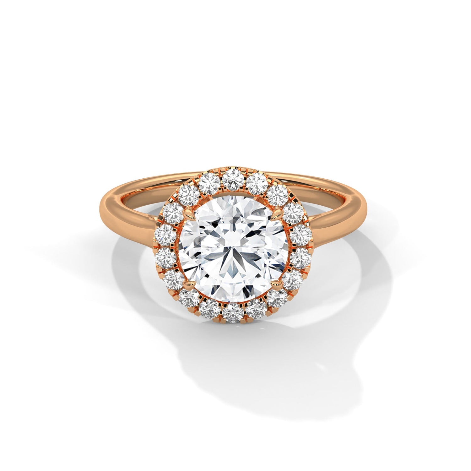 Rose gold ring with a large diamond on a white background 