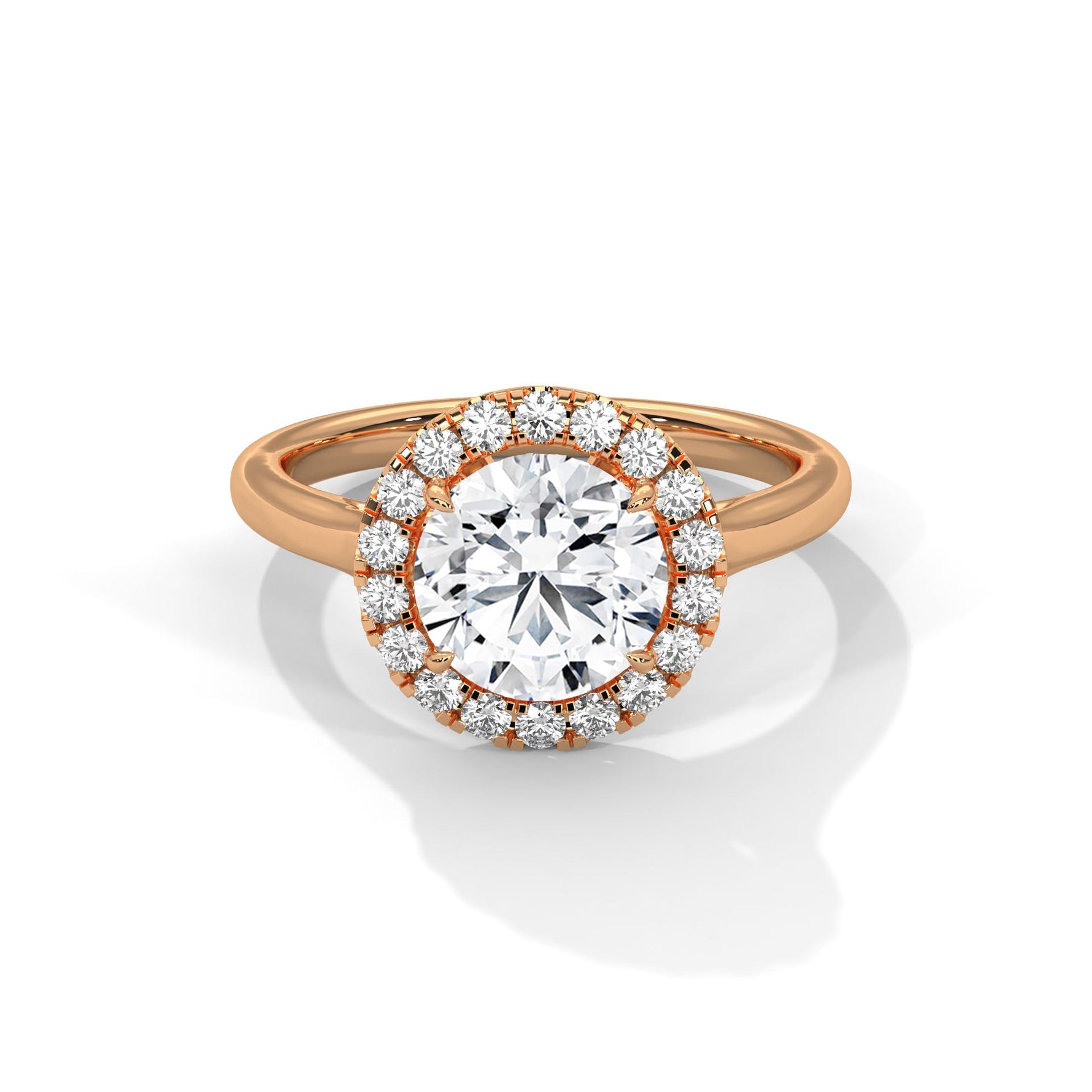 Rose gold ring with a large diamond on a white background #rose-gold