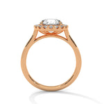 Rose gold ring with a large diamond on a white background 
