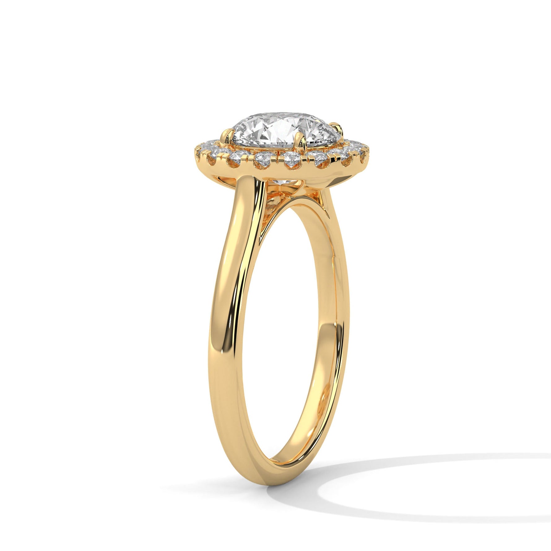 Gold ring with a large diamond on a white background 