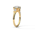 Gold ring with a large diamond on a white background 