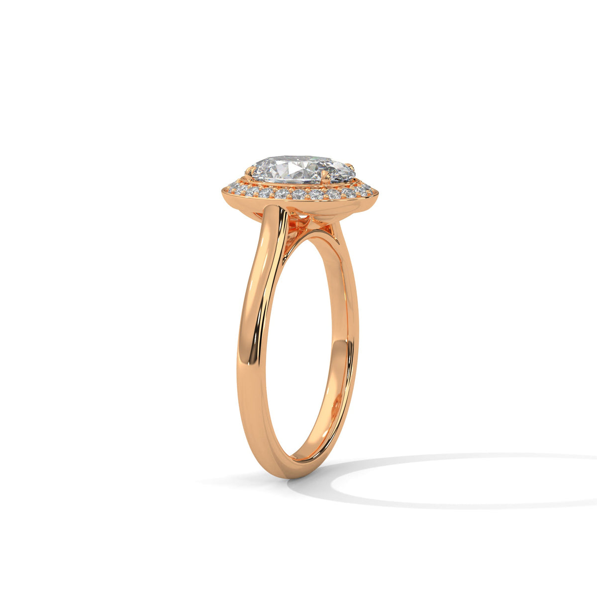 Rose gold ring with a large diamond on a white background 