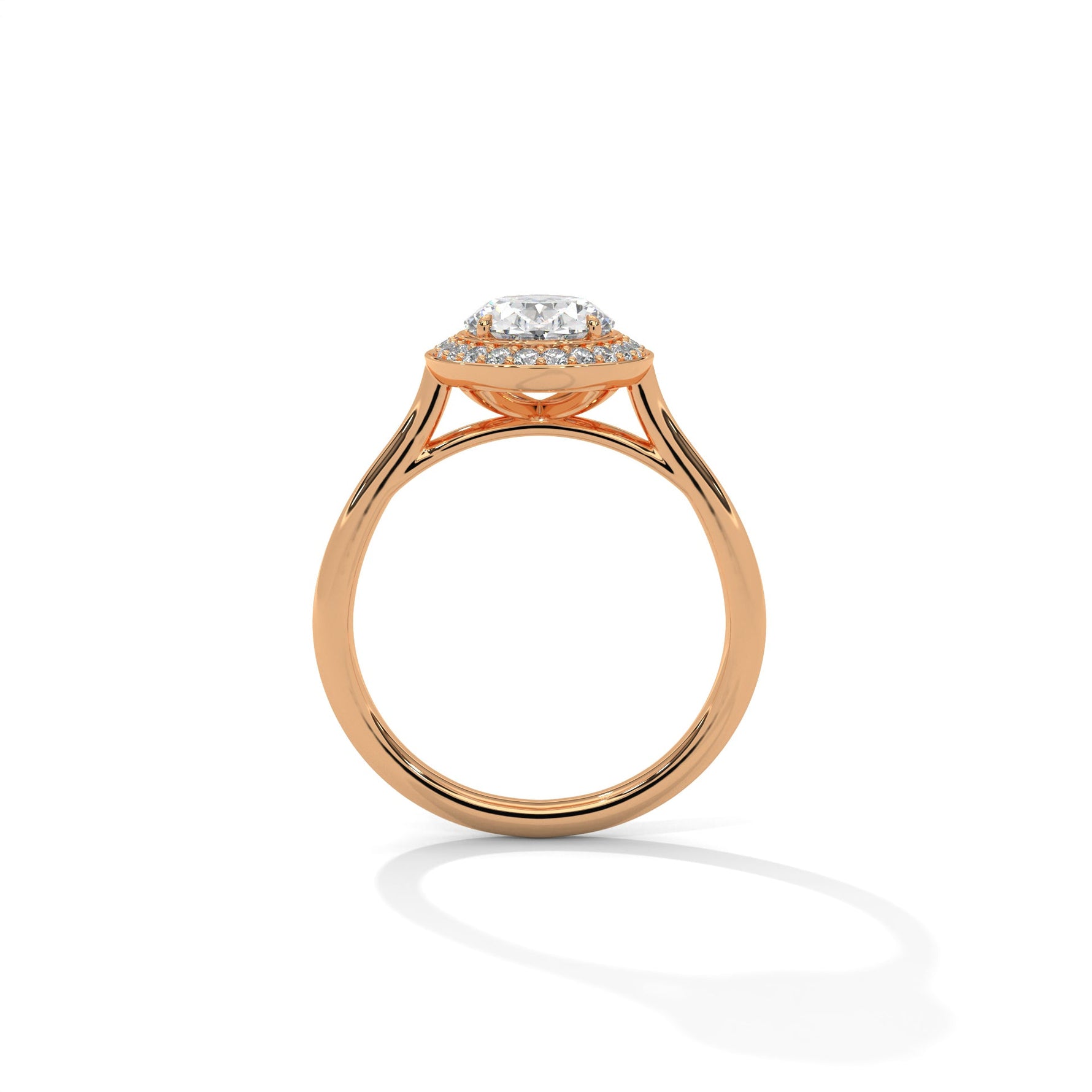 Close-up of a woman's hand wearing a diamond ring on a neutral background 