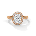 Rose gold ring with a large diamond on a white background 