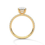 Gold ring with a large diamond on a white background 