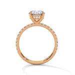 Rose gold ring with a large diamond on a white background 