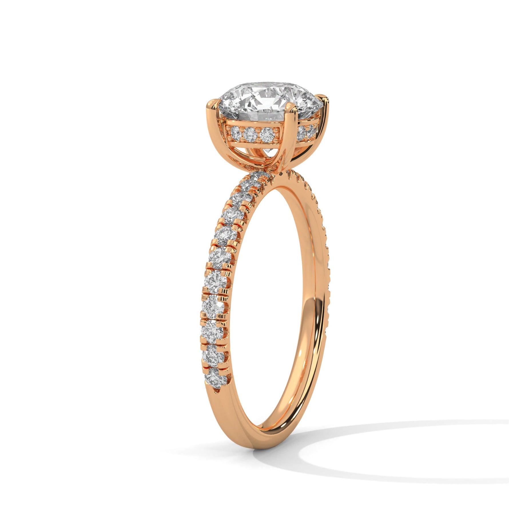 Rose gold ring with a large diamond on a white background 