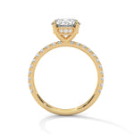 Gold ring with a large diamond on a white background 