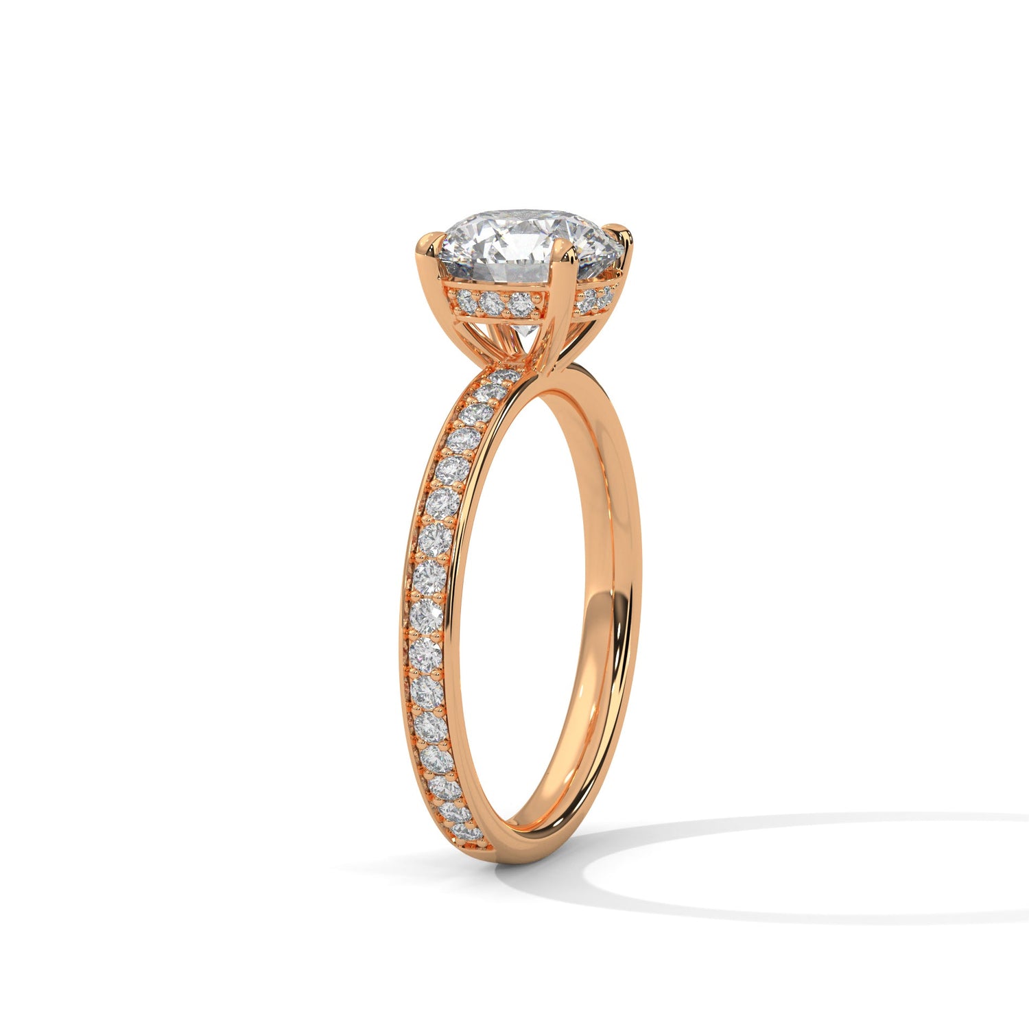 Rose gold ring with a large diamond on a white background 