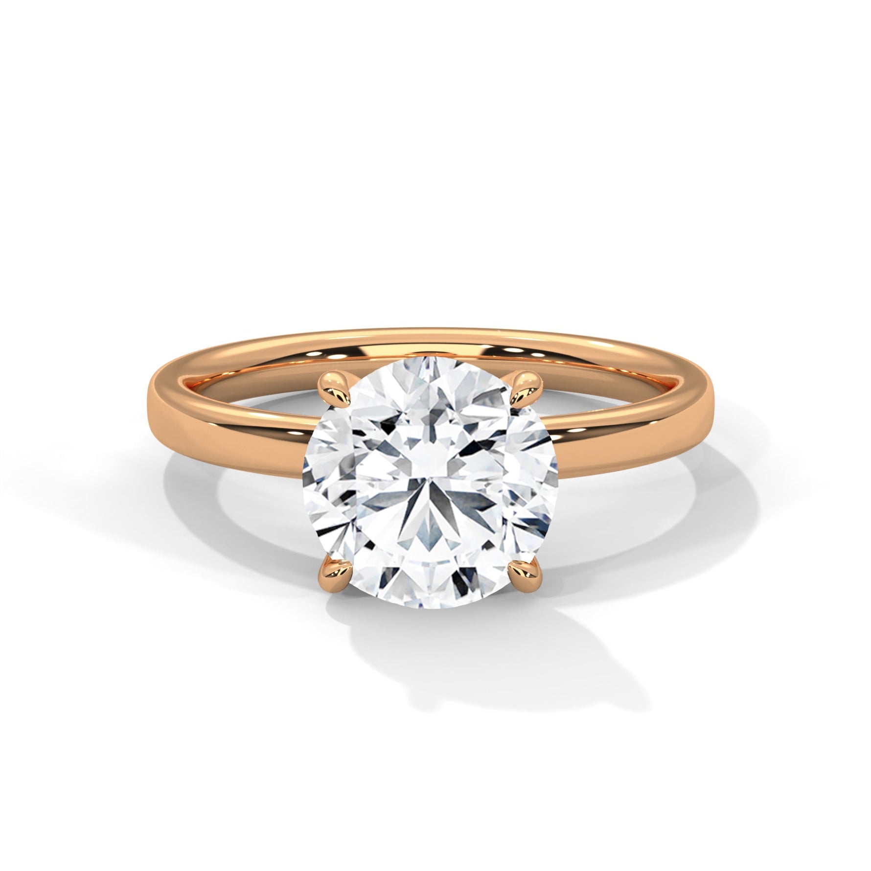 Rose gold ring with a large diamond on a white background #rose-gold