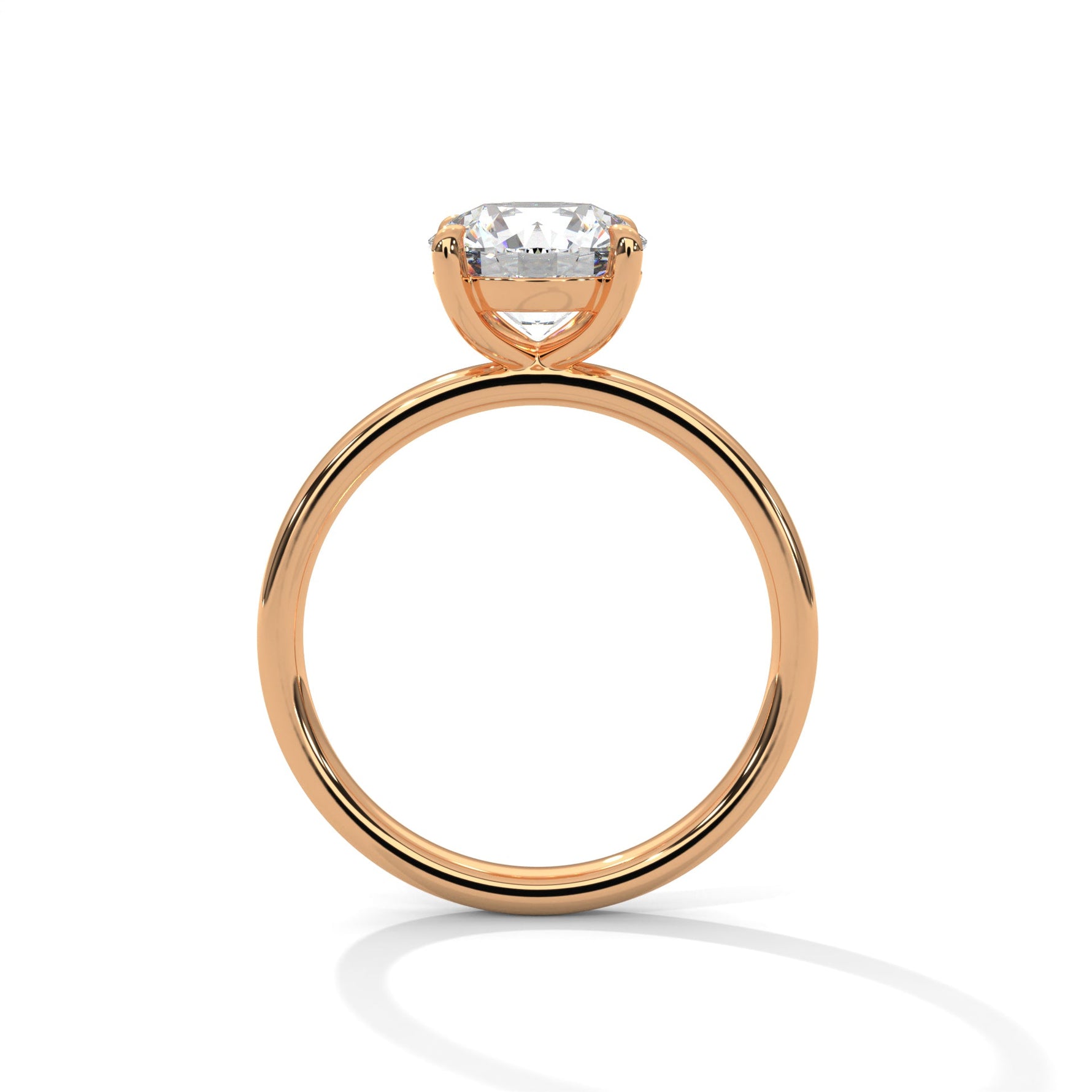 Rose gold ring with a large diamond on a white background 