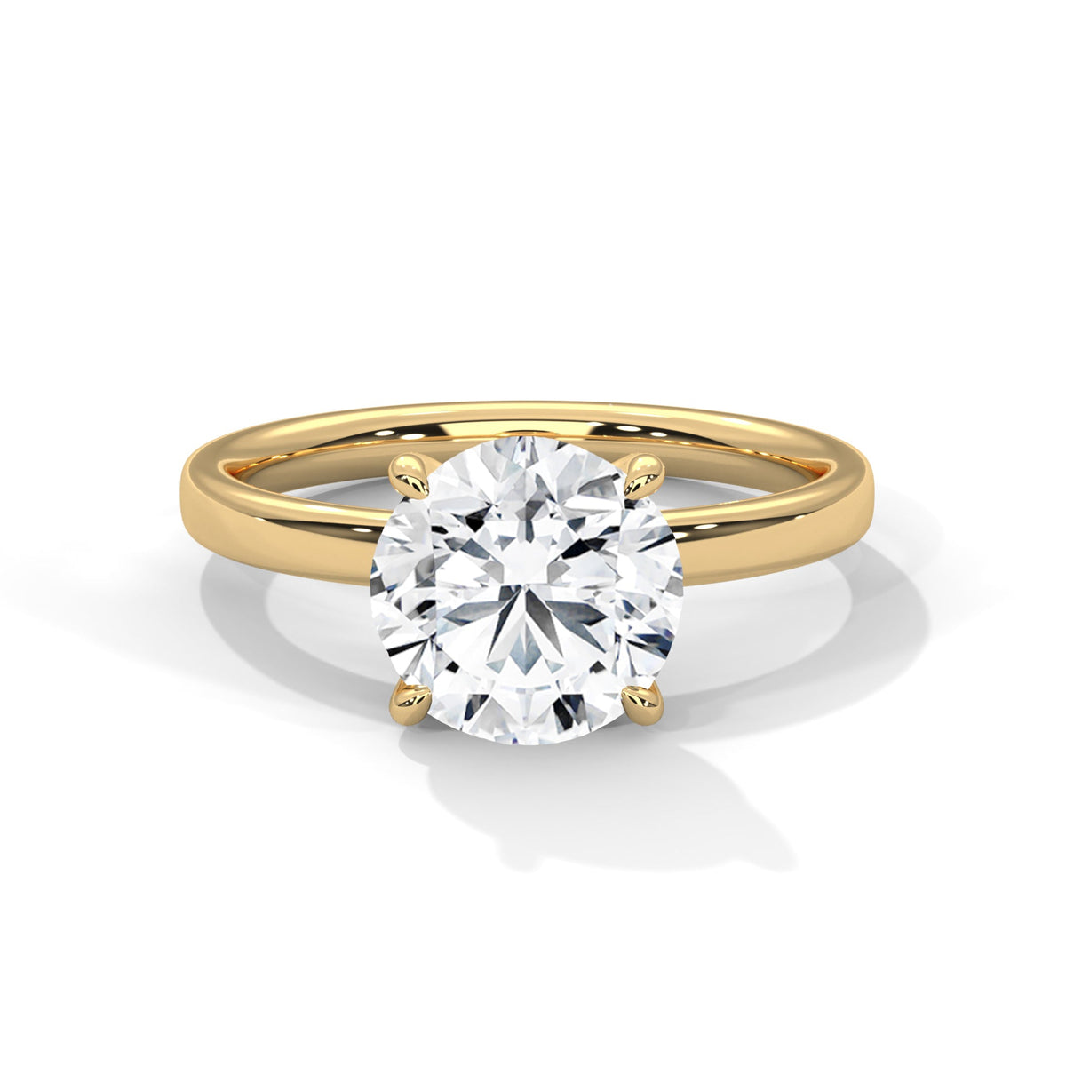 Gold ring with a large diamond on a white background 
