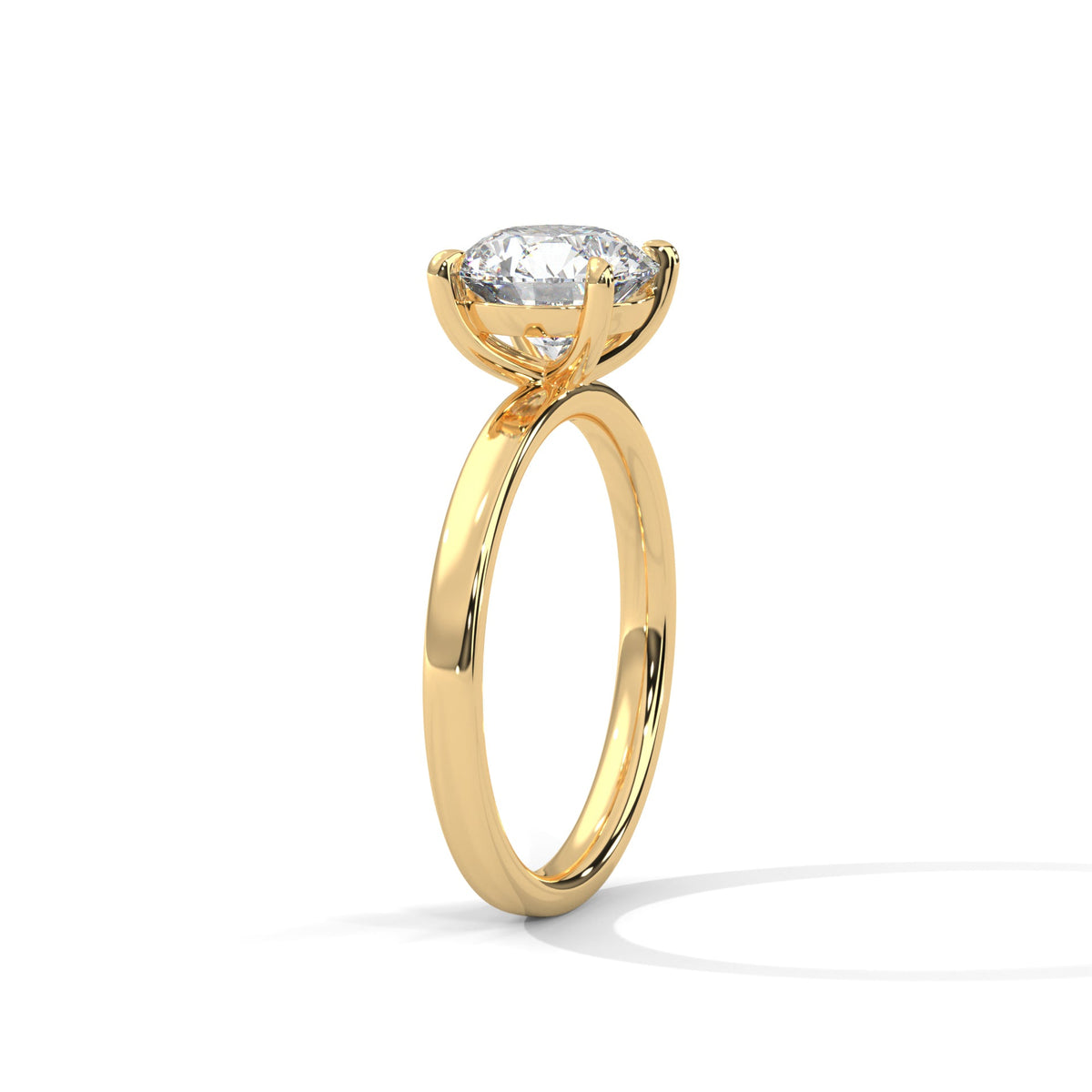 Gold ring with a large diamond on a white background 