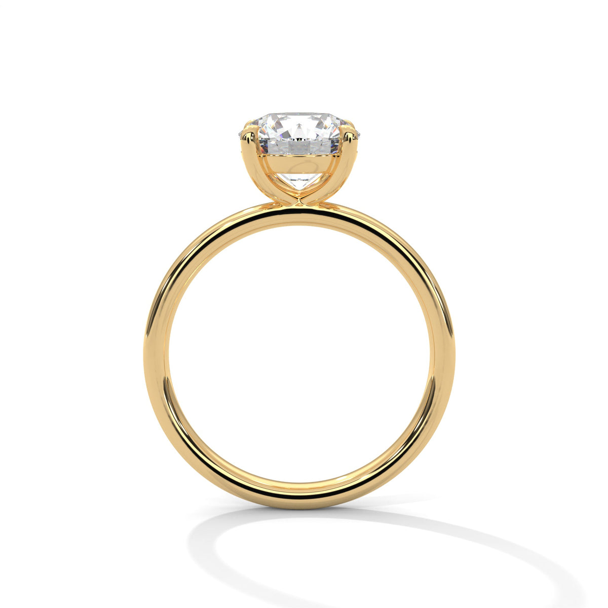 Gold ring with a large diamond on a white background 